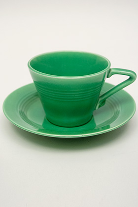 Vintage Harlequin Pottery Original Green Cup and Saucer Set For Sale
Vintage Harlequin Pottery Original Green Cup and Saucer Set For Sale