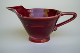 Rare Harlequin Pottery Maroon High Lip Creamer For Sale
Rare Harlequin Pottery Maroon High Lip Creamer For Sale