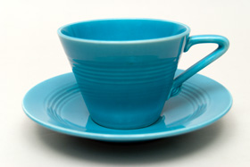 Vintage Harlequin Pottery Chartreuse Cup and Saucer Set For Sale
Vintage Harlequin Pottery Chartreuse Cup and Saucer Set For Sale