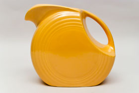 Vintage Fiestaware Disk Water Pitcher in Original Yellow Glaze
Vintage Fiestaware Disk Water Pitcher in Original Yellow Glaze