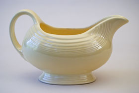 Vintage Fiesta Sauce Boat in Original Ivory Fiestaware
Vintage Fiesta Sauce Boat in Original Ivory Fiestaware