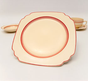 Extremely Rare Tripe Graduating Red Stripe Luncheon Plate Vellum Glaze For Sale Vintage Pottery 30s Americana Art Deco Dinnerware
Extremely Rare Tripe Graduating Red Stripe Luncheon Plate Vellum Glaze For Sale