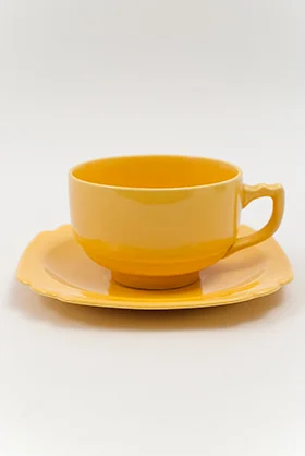 Vintage Riviera Pottery Teacup and Saucer Set in Original Harlequin Yellow Glaze