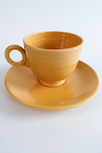 yellow vintage fiestaware teacup and saucer set for sale