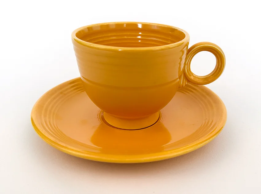 1936 yellow vintage fiesta flat bottom teacup and matching saucer set
